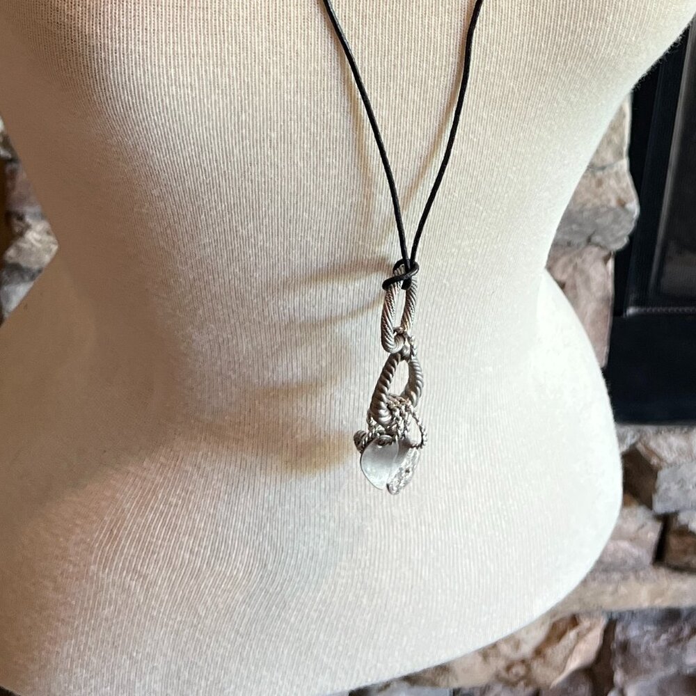 Casual Corner Leather cord necklace with silver toned charms